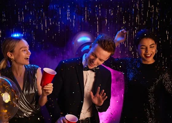 Students arriving at prom by limo