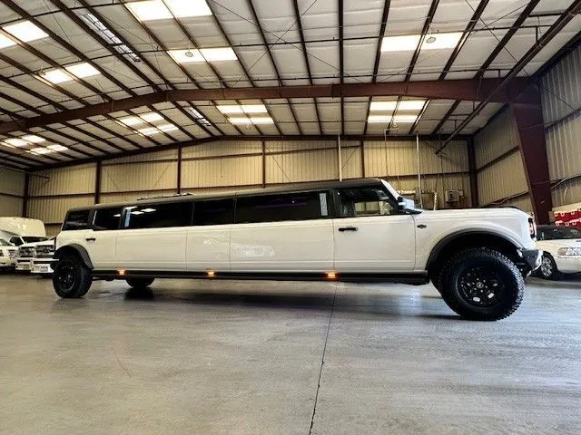 13 Passenger Bronco Limo with Jet Door for limo rental
