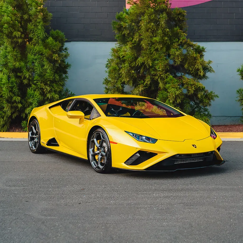Gold 2022 Lamborghini Huracan EVO Giallo Orion for sports car rental