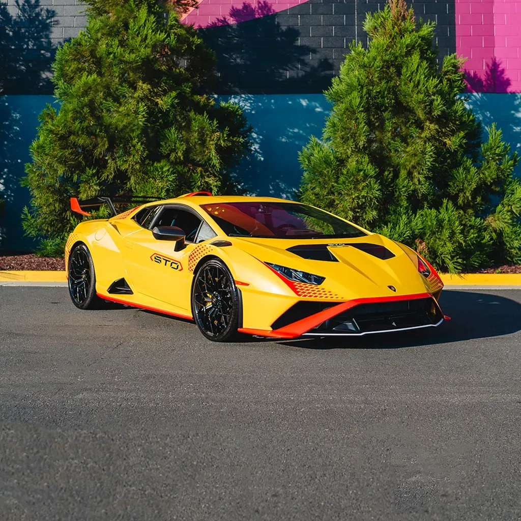 Orange 2023 Lamborghini Super Trofeo Omologata for sports car rental