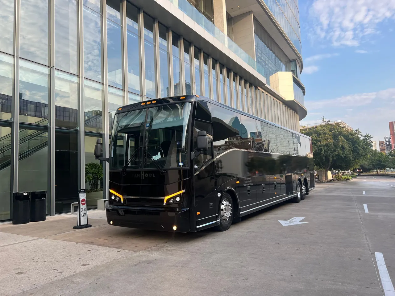 Black 56 Passenger Motorcoach for charter bus rental