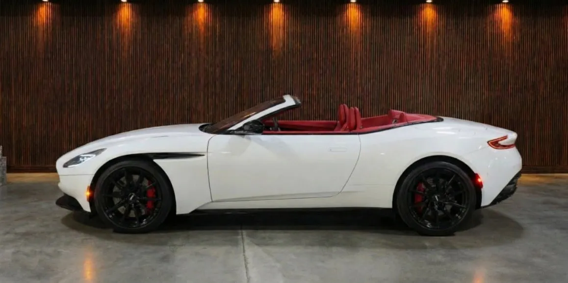 White Aston Martin DB11 exterior with convertible roof, photo 3 for sports car rental