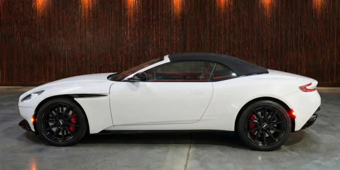 White Aston Martin DB11 exterior with convertible roof, photo 4 for sports car rental