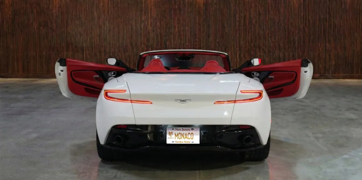 White Aston Martin DB11 exterior with convertible roof, photo 5 for sports car rental