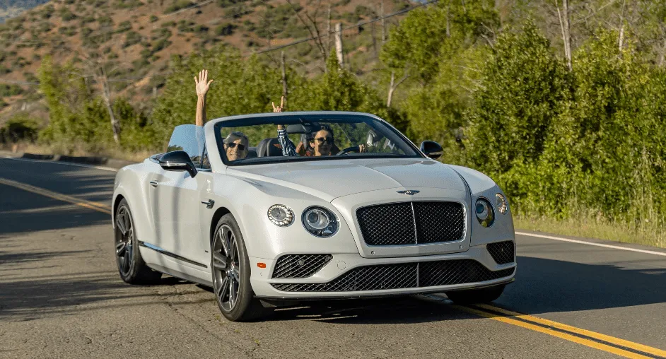 Bentley Continental GT White Bentley Continental GT with convertible roof for sports car rental