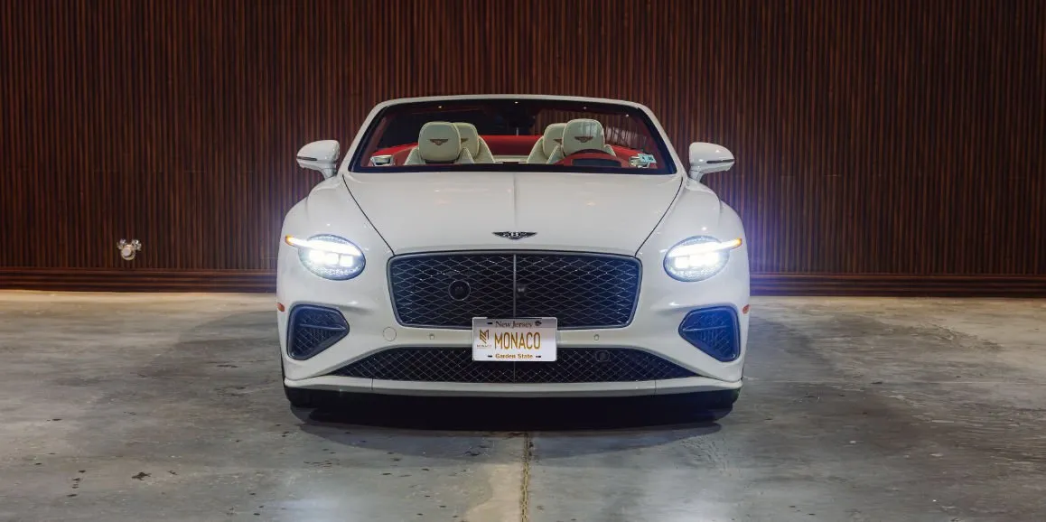White Bentley GTC Speed exterior with convertible roof for sports car rental