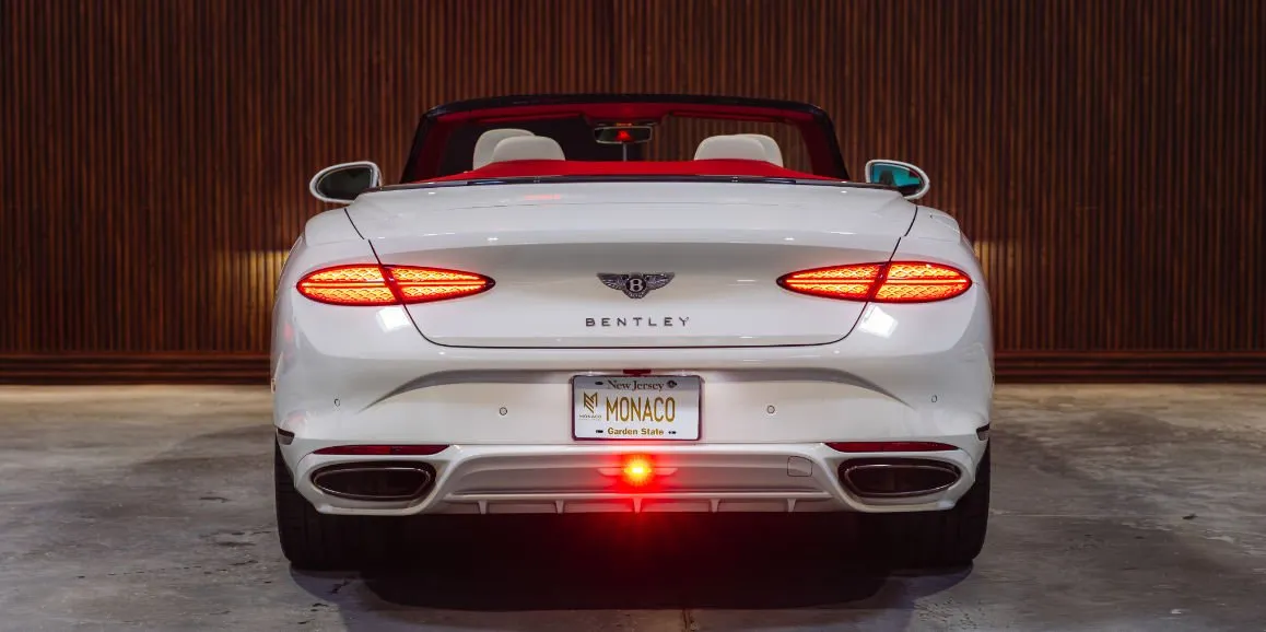 White Bentley GTC Speed exterior with convertible roof, photo 5 for sports car rental