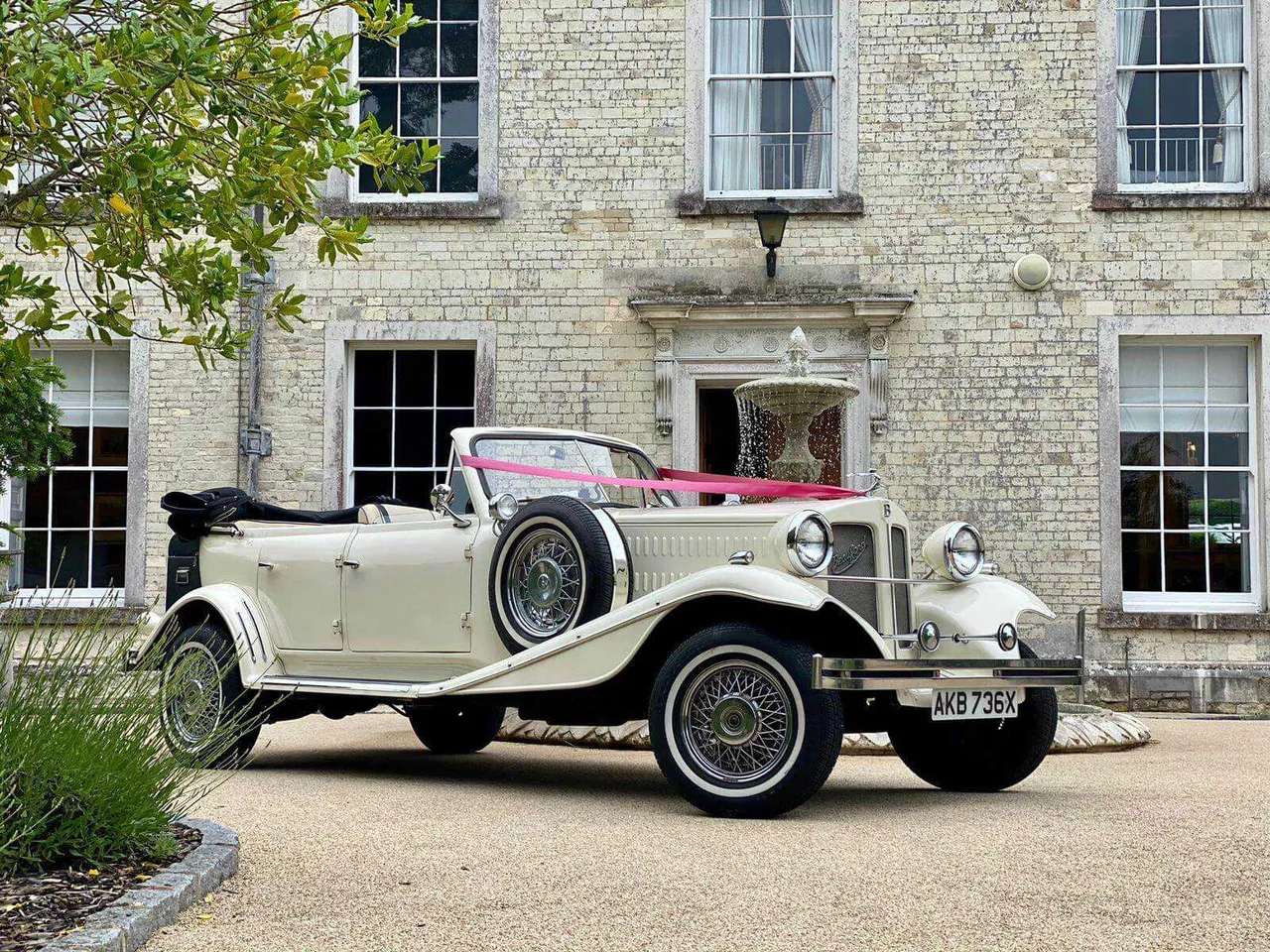 White Beuford 1920 for wedding car rental White Beuford 1920 for wedding car rental