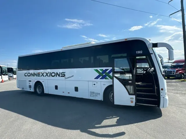 White 40 Passenger Charter Bus exterior for charter bus rental