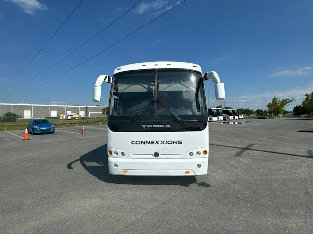 White 40 Passenger Charter Bus for charter bus rental