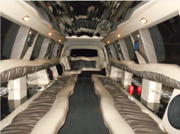 Cadillac Escalade Limousine cabin – perimeter lounge seating and mirrored ceiling
