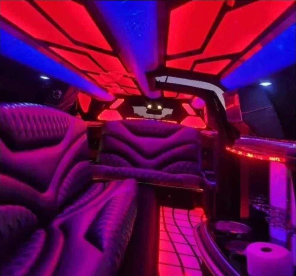 Charger Limo interior with LED accent lighting, LED ceiling lighting and lit dance floor for limo rental