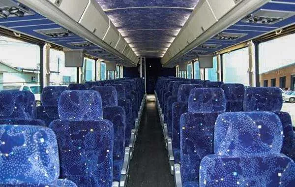 55 Passenger Charter Bus cabin – overhead parcel racks