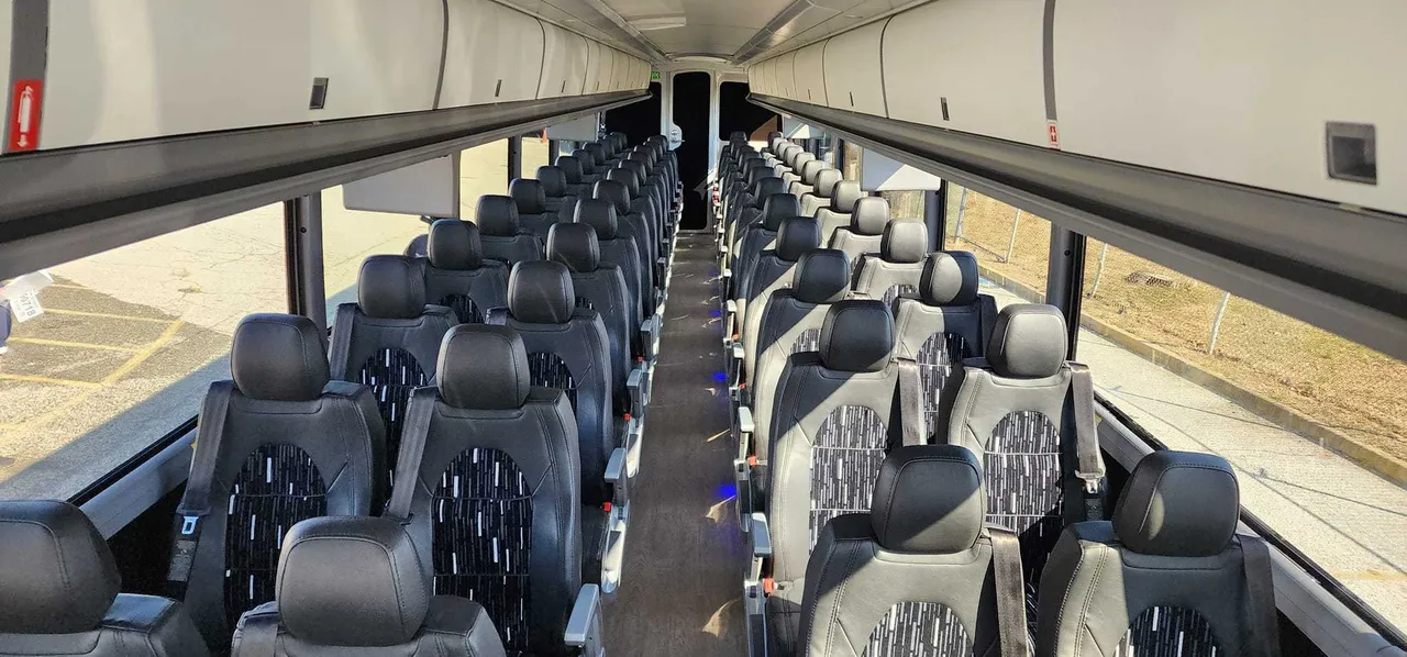 Charter Bus From 20 Pax to 50 Pax interior with overhead parcel racks for charter bus rental