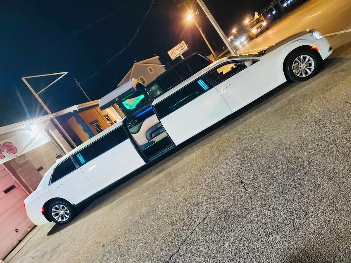 White Chrysler 300 Jet Doors exterior with bridal (jet) door, photo 4 for limo rental