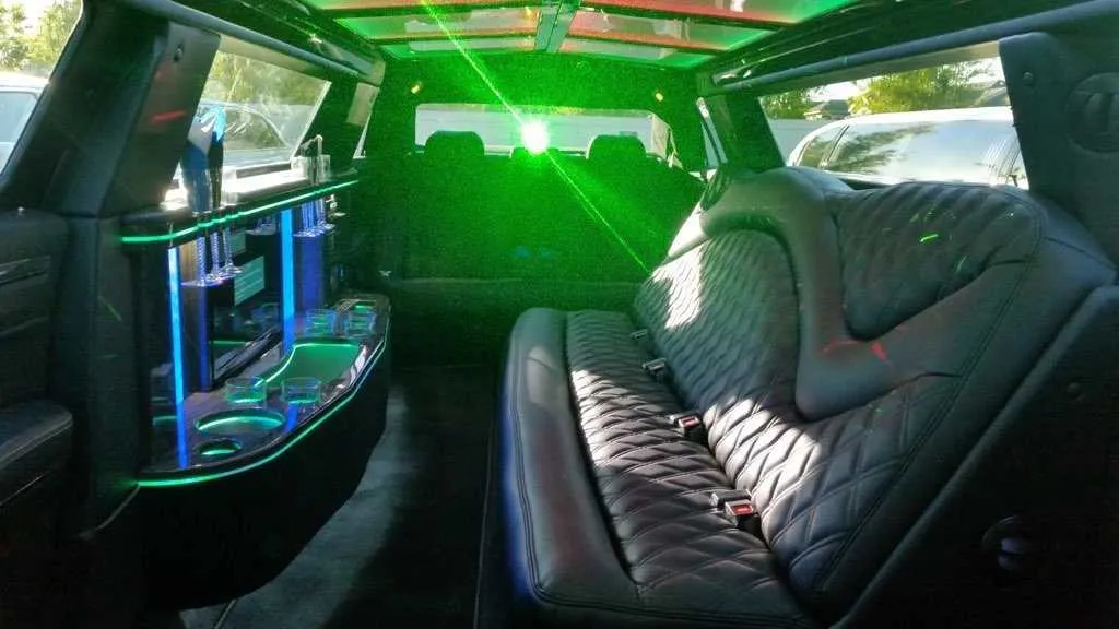 Chrysler Stretch Limo interior with LED accent lighting and bar area for limo rental