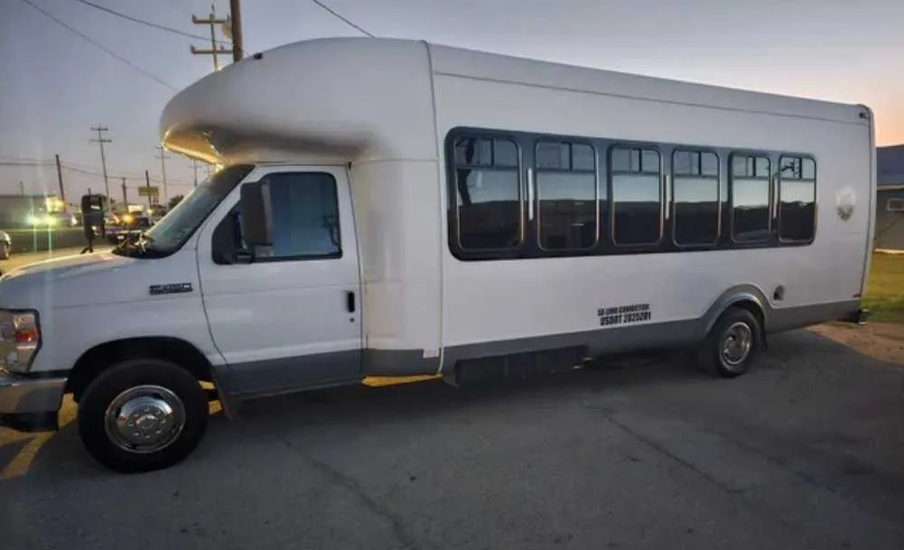 White D-Town Bus exterior for party bus rental