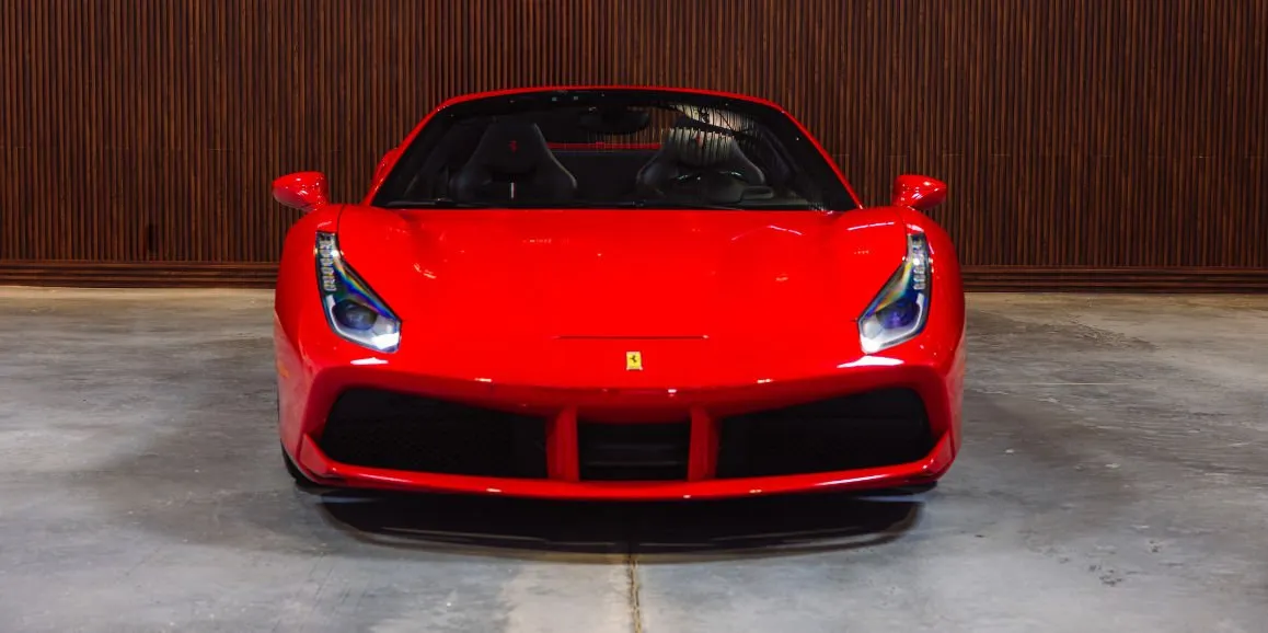 Red Ferrari 488 Spider exterior for sports car rental