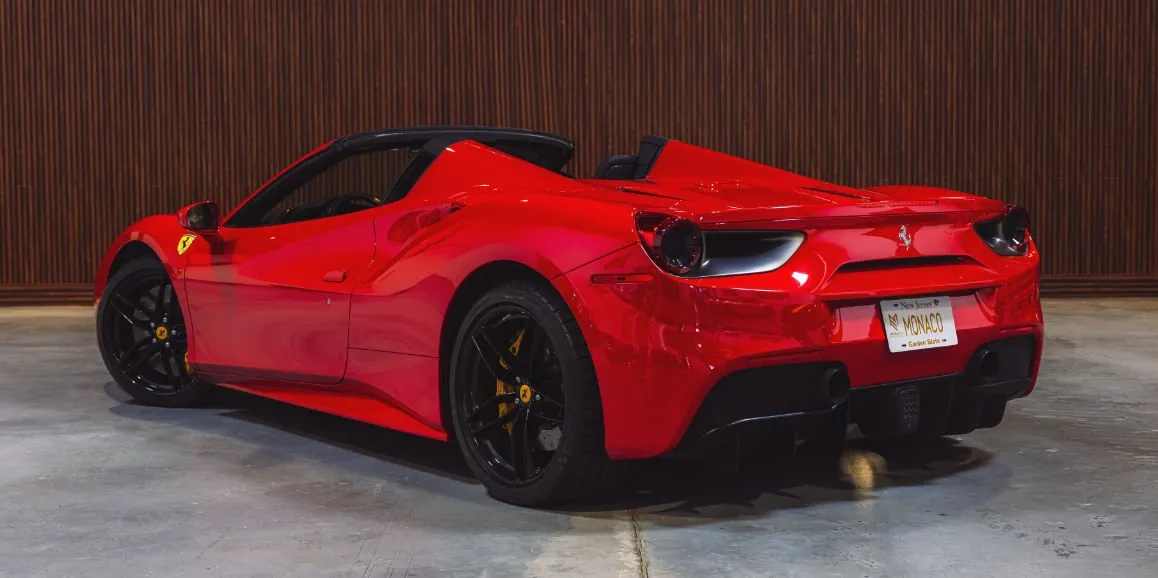 Red Ferrari 488 Spider exterior with convertible roof, photo 4 for sports car rental