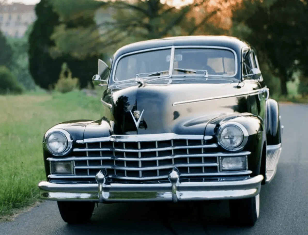 Blue Fleetwood Cadillac exterior, photo 3 for wedding car rental