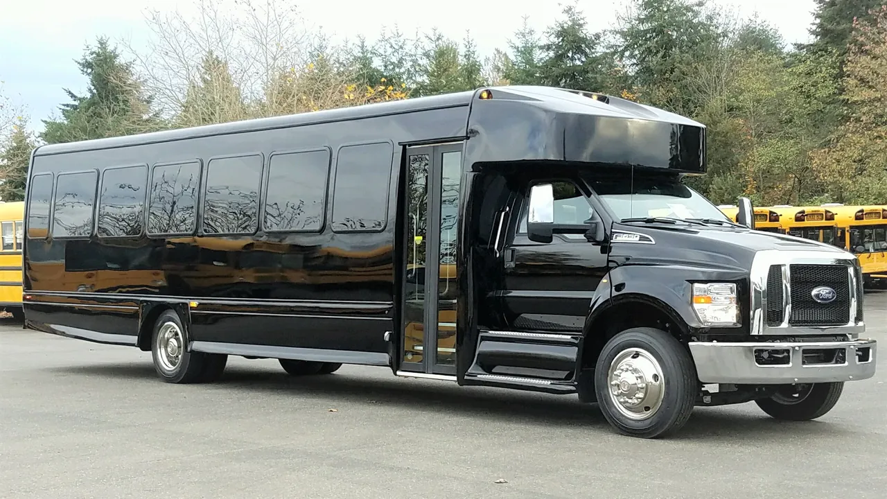 Black Ford F650 Executive VIP Shuttle Bus (44 Passenger), photo 2 for charter bus rental