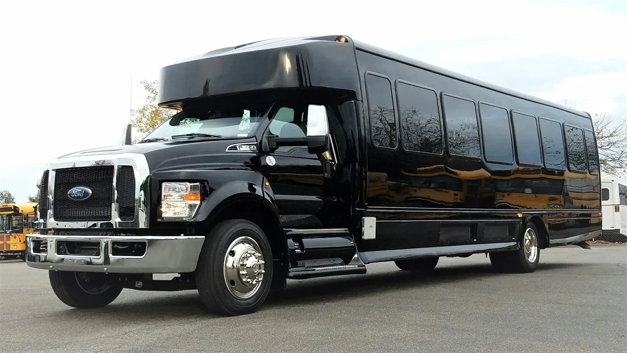 Black Ford F650 Executive VIP Shuttle Bus (44 Passenger), photo 3 for charter bus rental