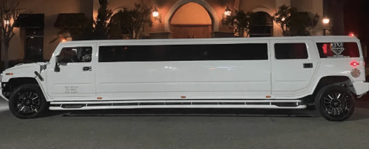 White Hummer Limousine with tinted windows for limo rental