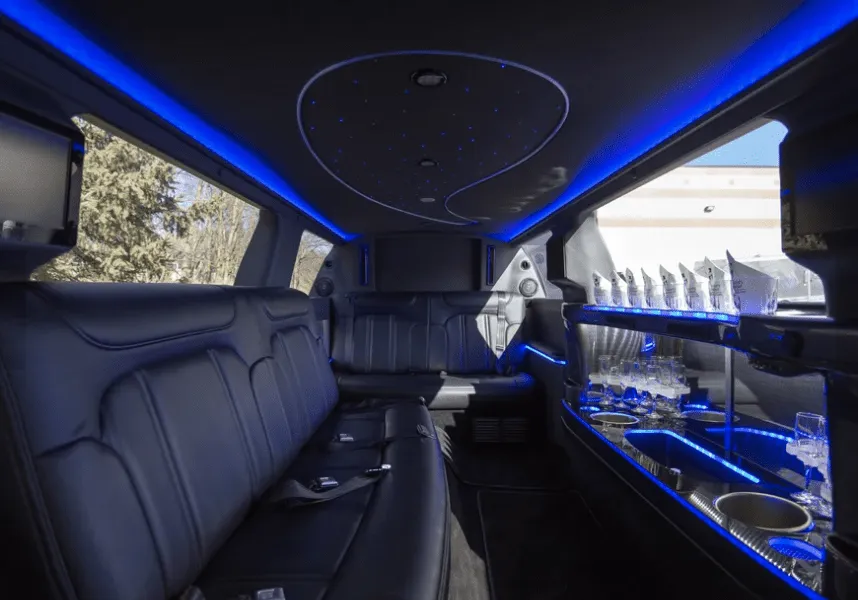 Lincoln MKT Limo interior with LED accent lighting, starlight or fiber-optic ceiling and bar area for limo rental