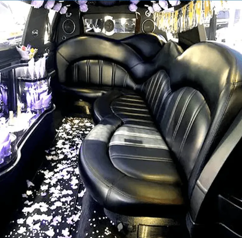 Lincoln MKT Limo interior with sofa-style seating for limo rental