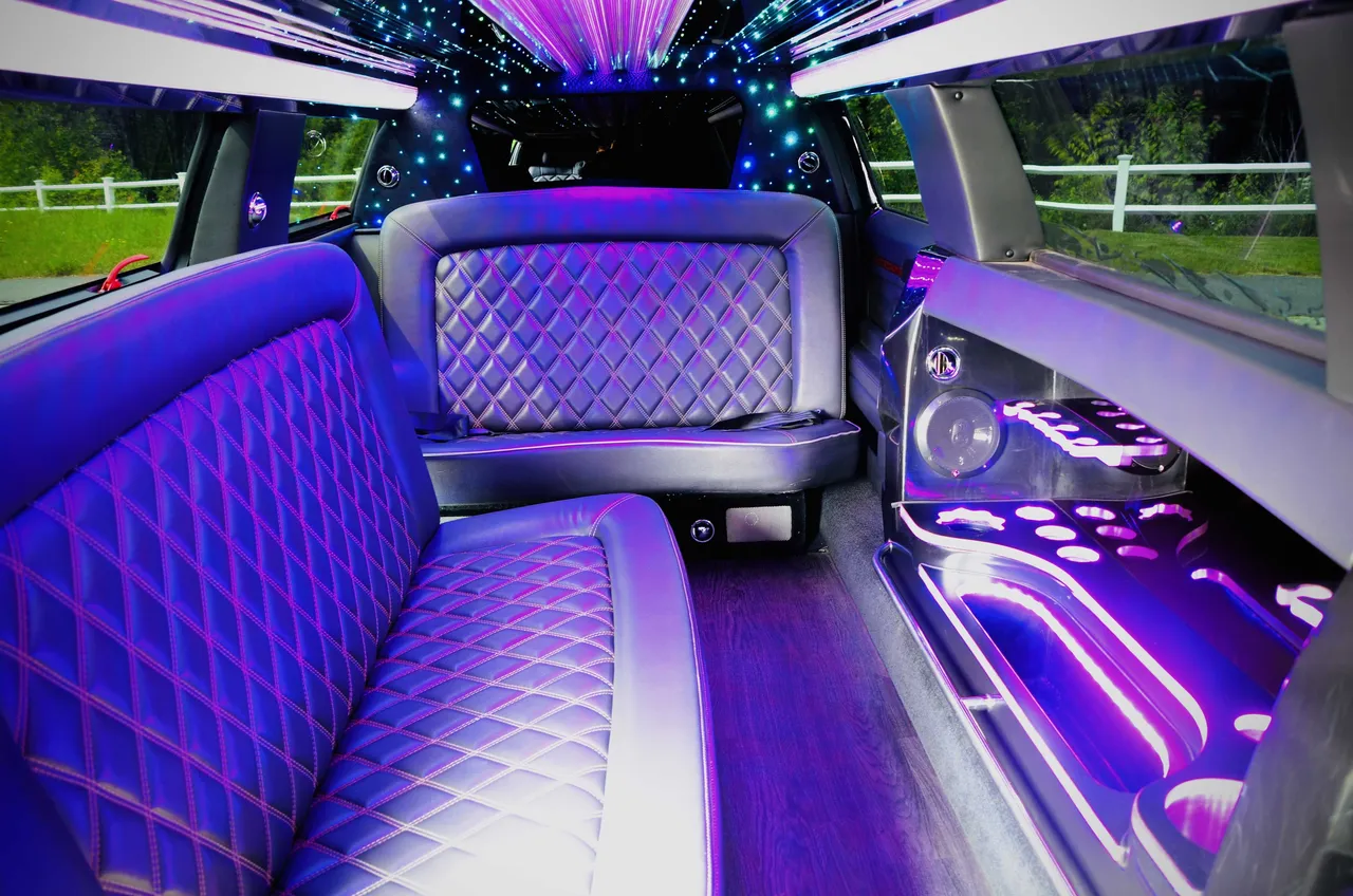 Lincoln MKT Limo Lincoln MKT Limo interior with LED accent lighting, LED ceiling lighting and starlight or fiber-optic ceiling for limo rental