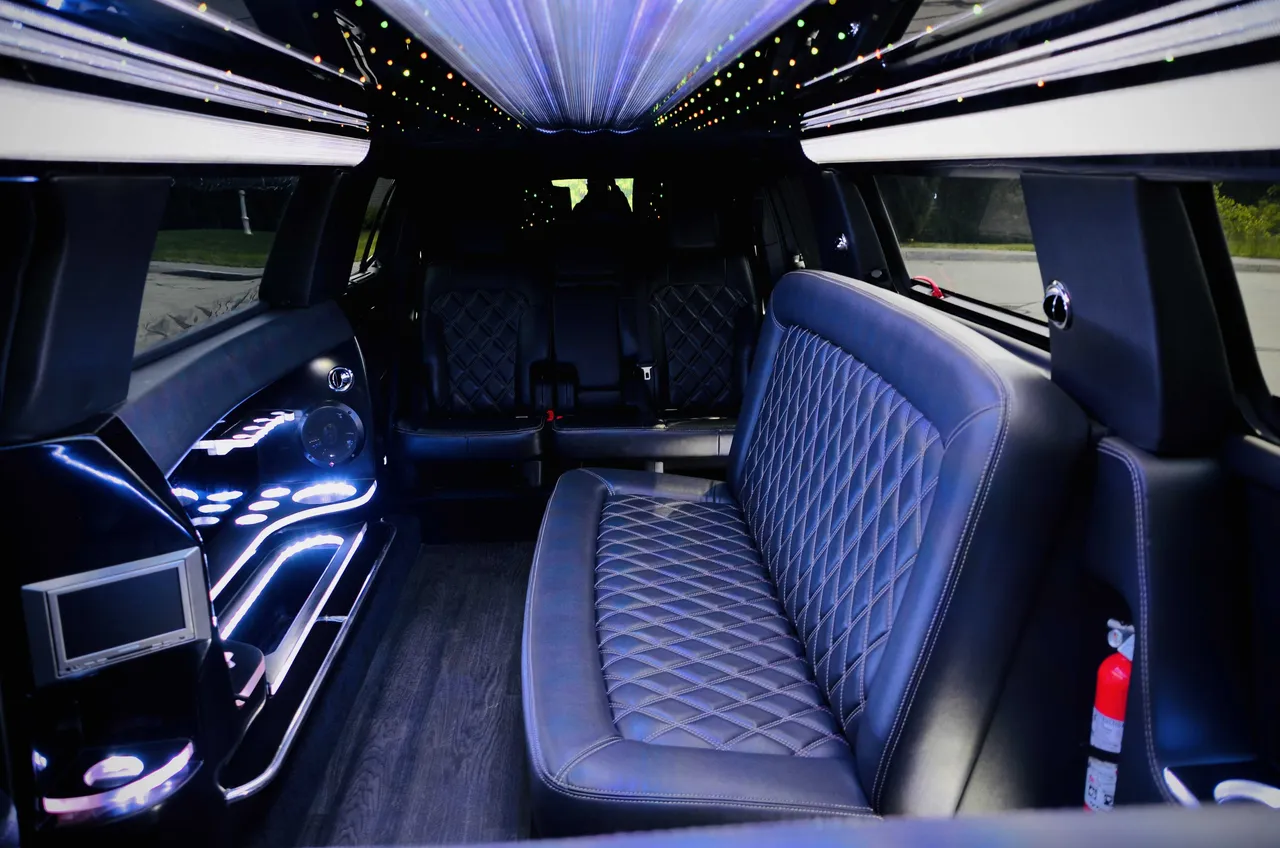 Lincoln MKT Limo interior with LED accent lighting, LED ceiling lighting and starlight or fiber-optic ceiling, photo 3 for limo rental
