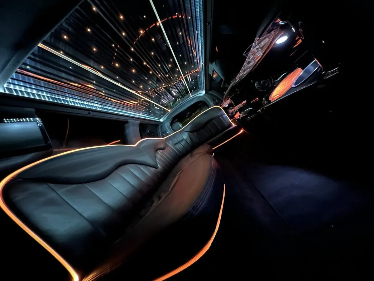 Lincoln Town CAR Limousine interior with LED accent lighting, LED ceiling lighting and starlight or fiber-optic ceiling, photo 6 for limo rental