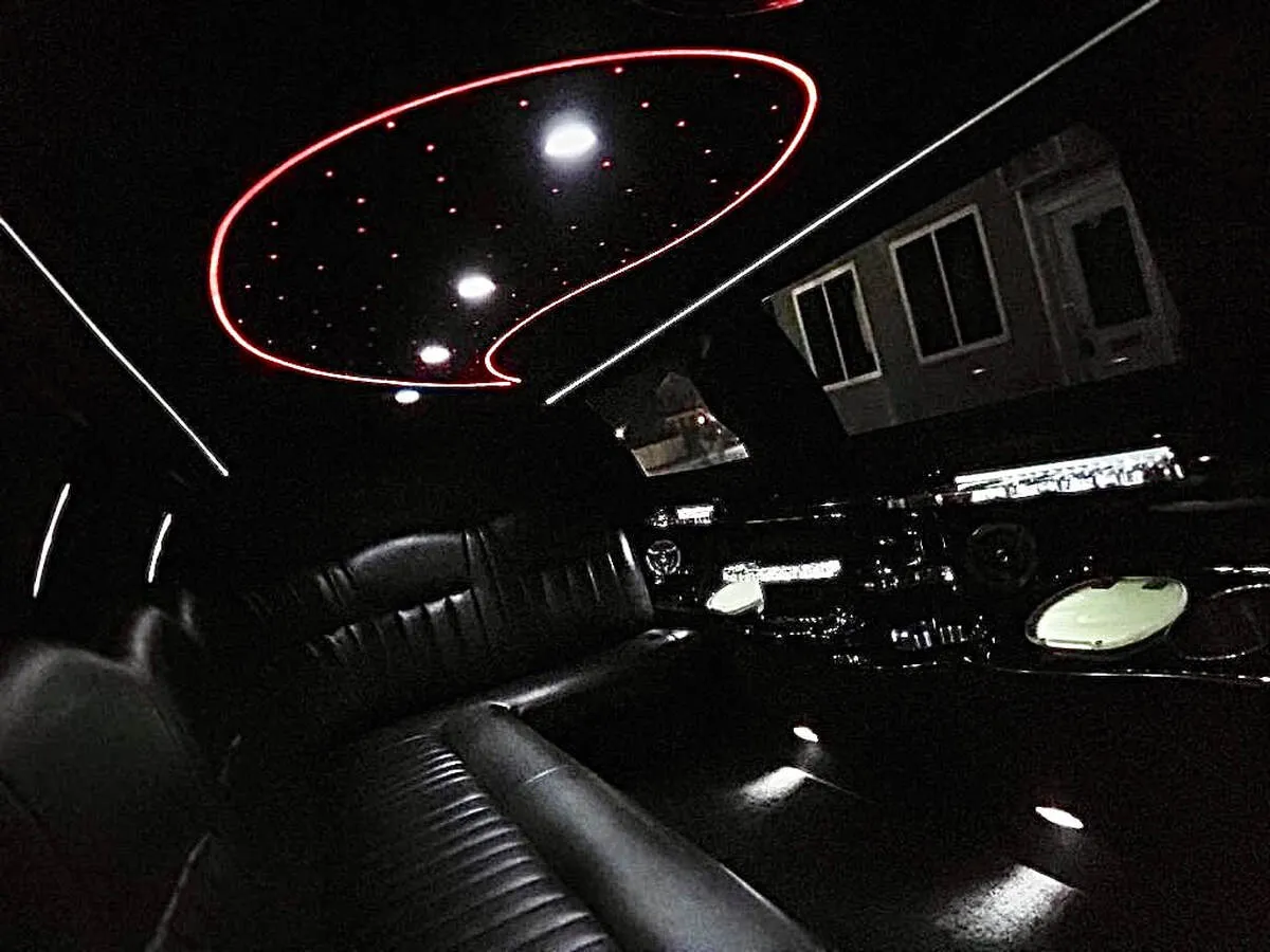 Lincoln Town Car Limousine interior with starlight or fiber-optic ceiling, photo 7 for limo rental