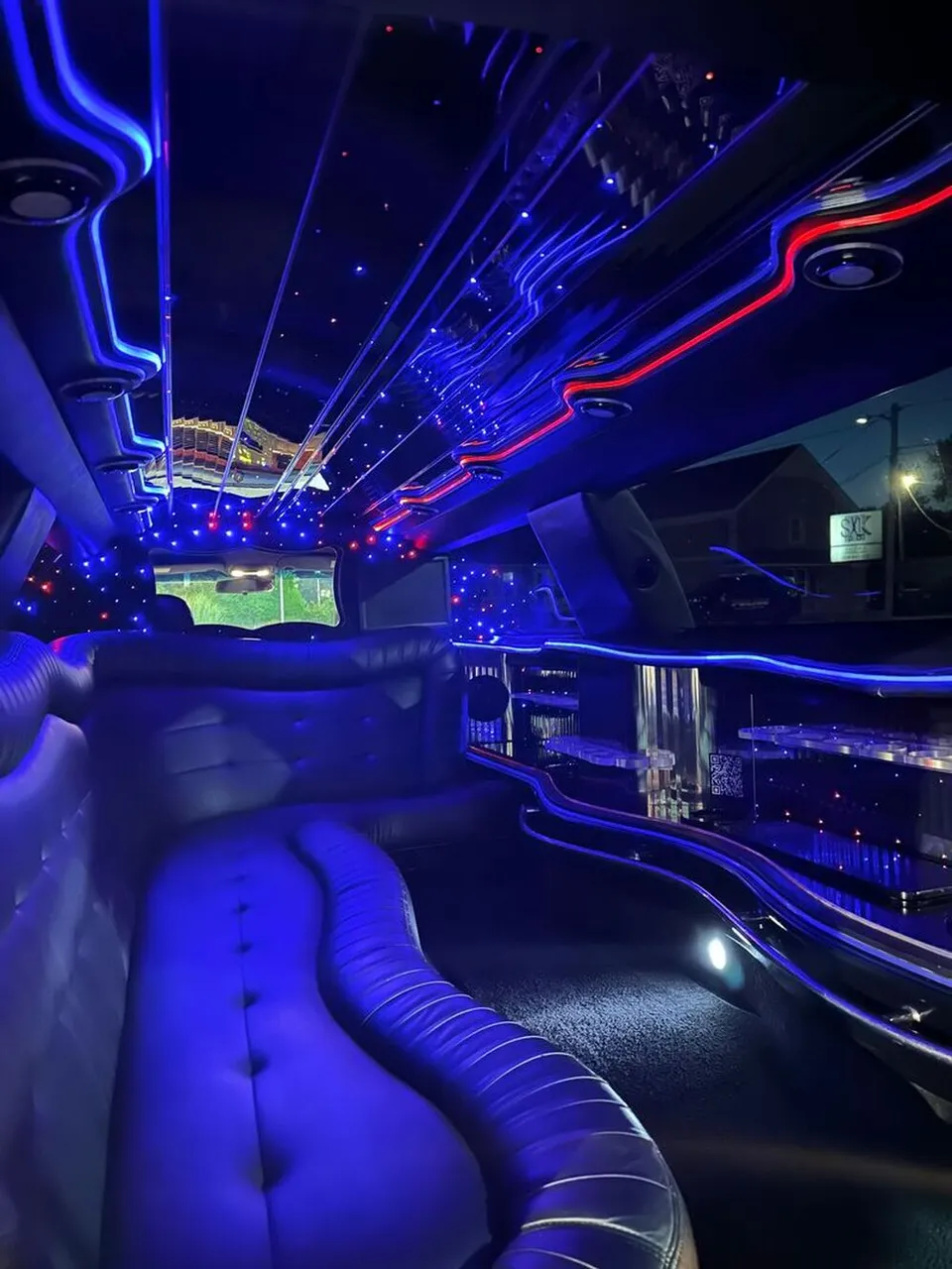 Lincoln Town Car Limousine interior with sofa-style seating, LED accent lighting and starlight or fiber-optic ceiling, photo 9 for limo rental