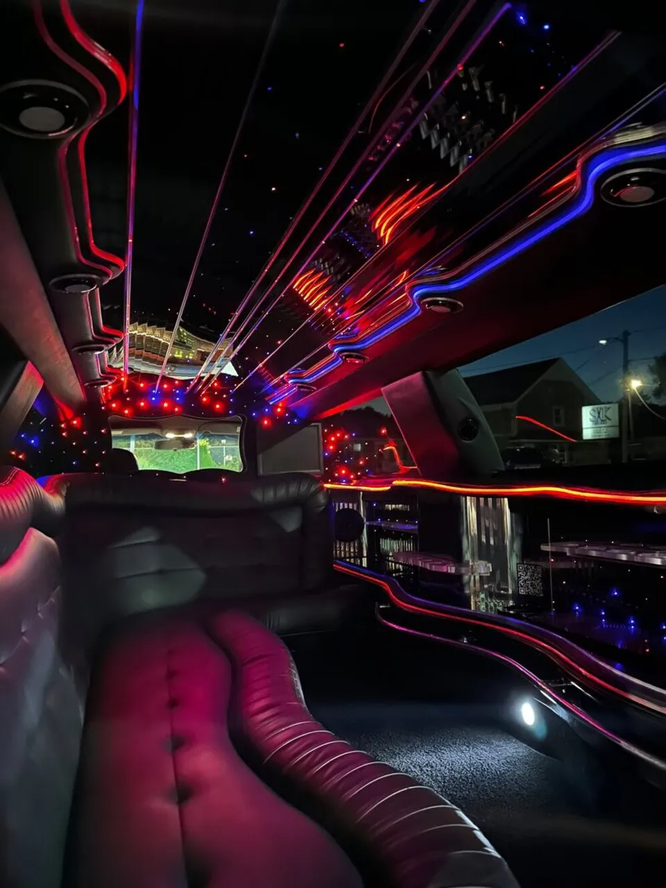 Lincoln Town Car Limousine interior with sofa-style seating, LED accent lighting and starlight or fiber-optic ceiling, photo 10 for limo rental