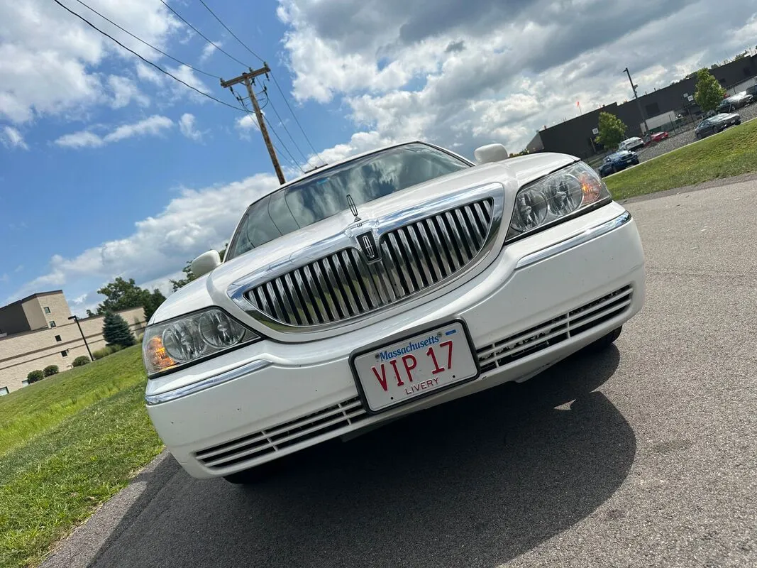 White Lincoln Town CAR Limousine exterior for limo rental
