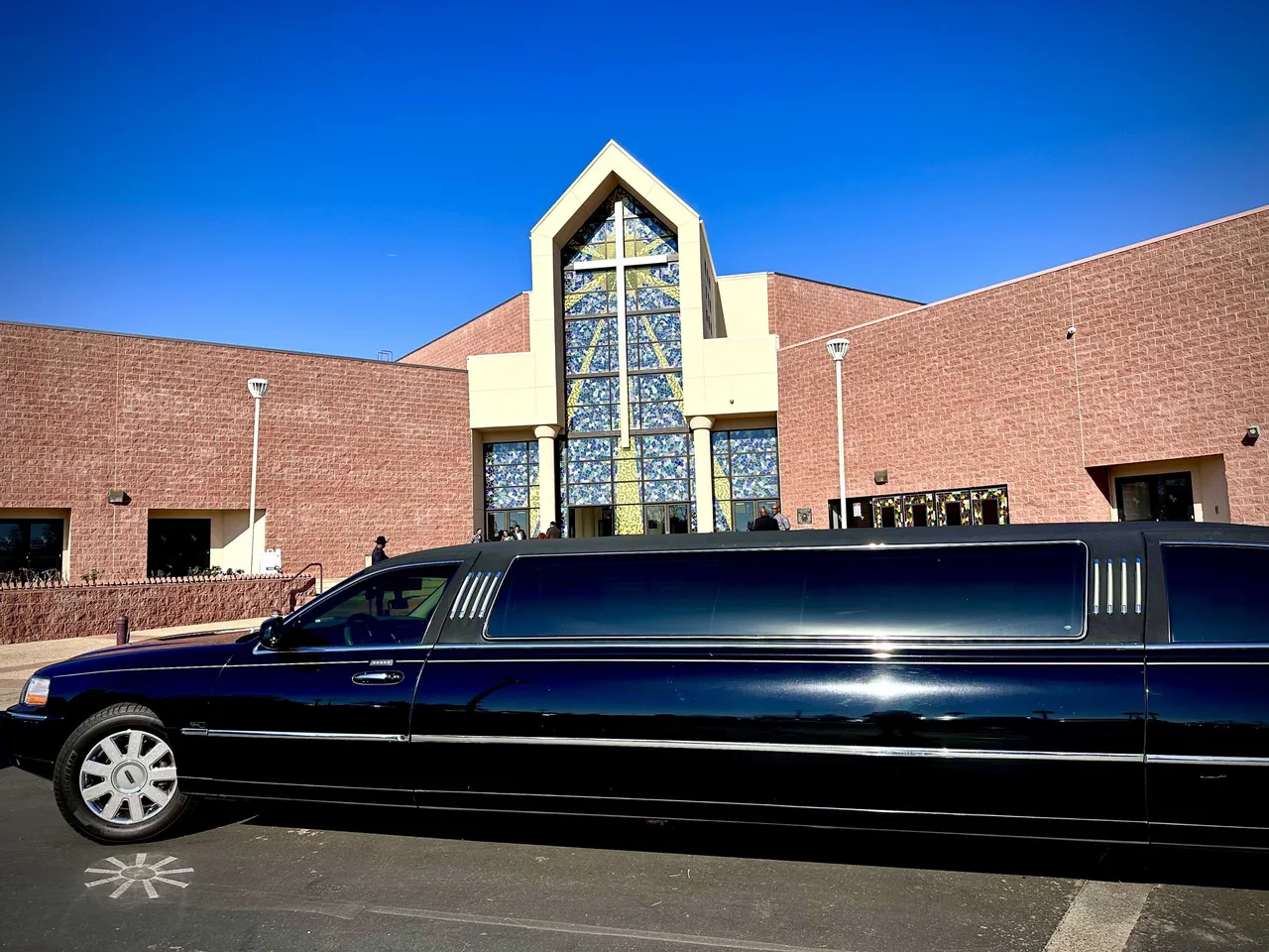 Black Lincoln Towncar Limo exterior with tinted windows for limo rental
