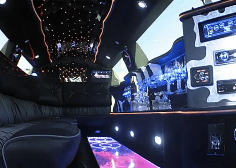 Lincoln Towncar Limo Tuxedo interior with LED accent lighting, starlight or fiber-optic ceiling and lit dance floor for limo rental