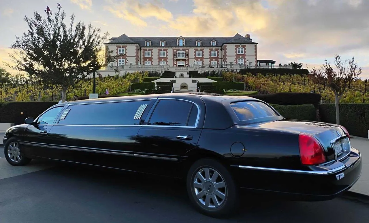 Black Lincoln Towncar Stretch Limousine with tinted windows for limo rental