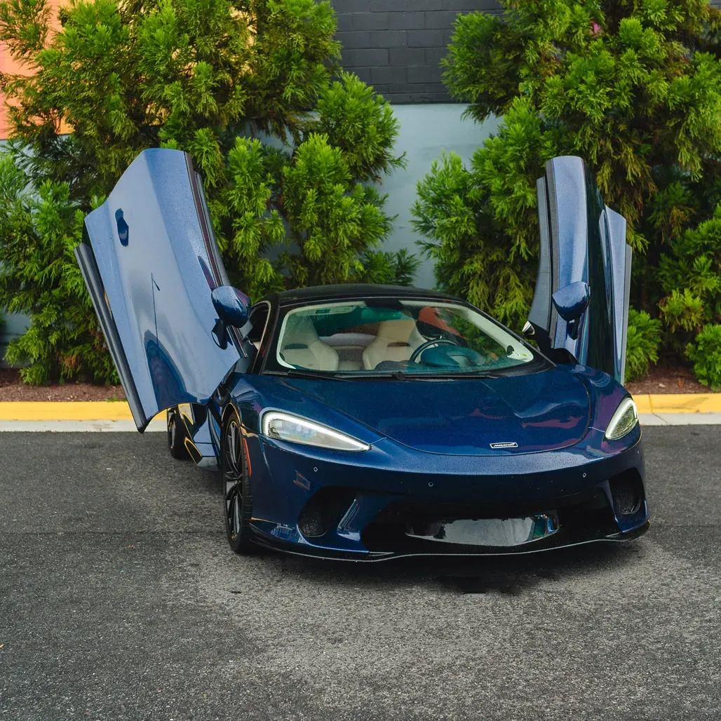 McLaren GT Aurora Blue for sports car rental