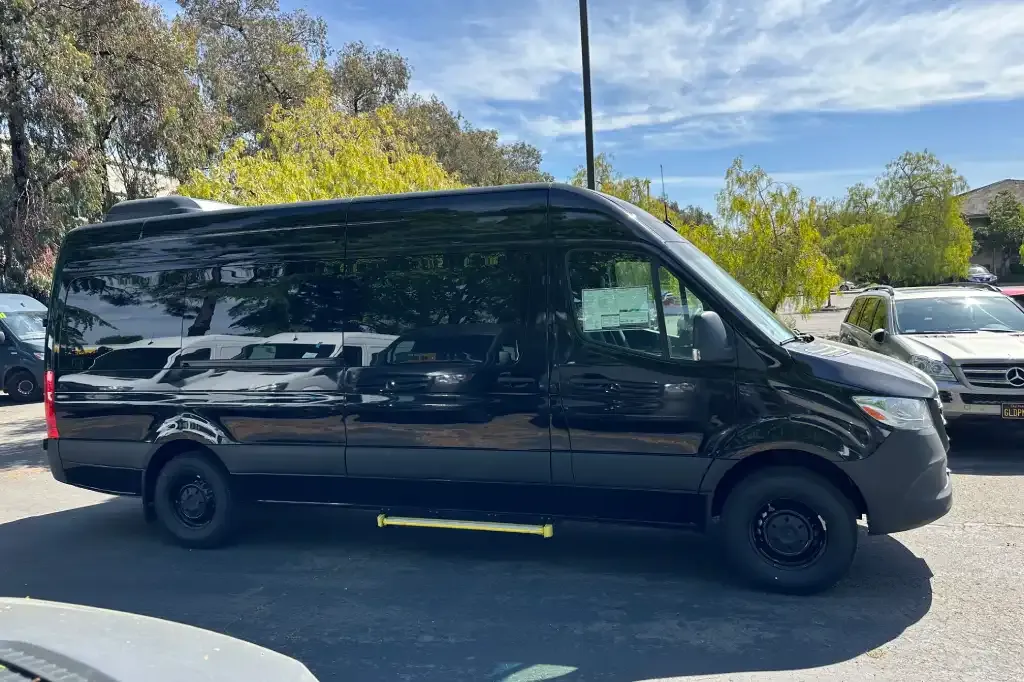 Mercedes-Benz Sprinter Limousine — 13 Passengers for party bus rental