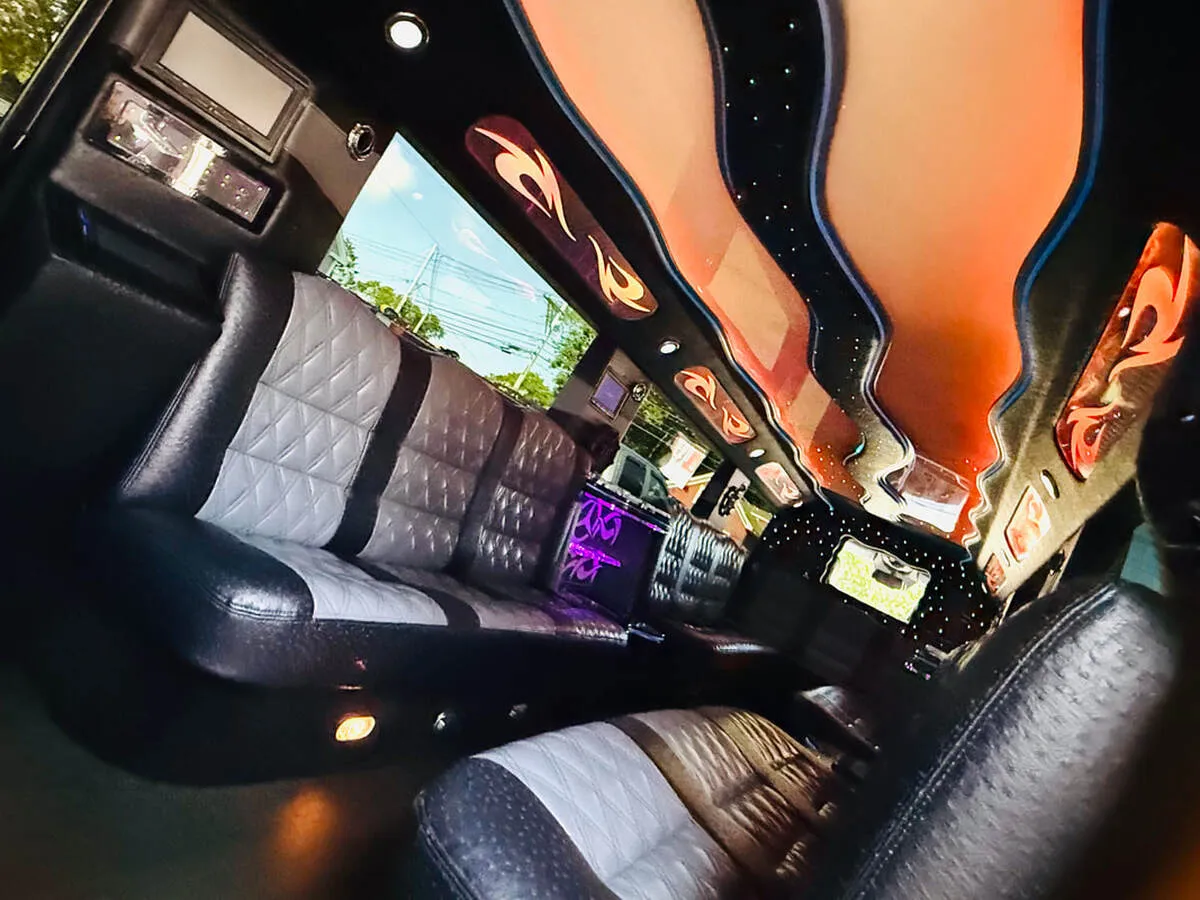 Mercedes-Benz G Wagon interior with perimeter lounge seating, LED ceiling lighting and starlight or fiber-optic ceiling for limo rental