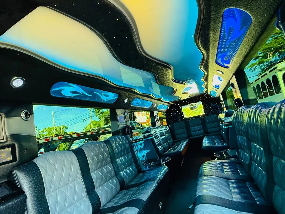 Mercedes-Benz G Wagon interior with perimeter lounge seating, LED ceiling lighting and starlight or fiber-optic ceiling, photo 9 for limo rental