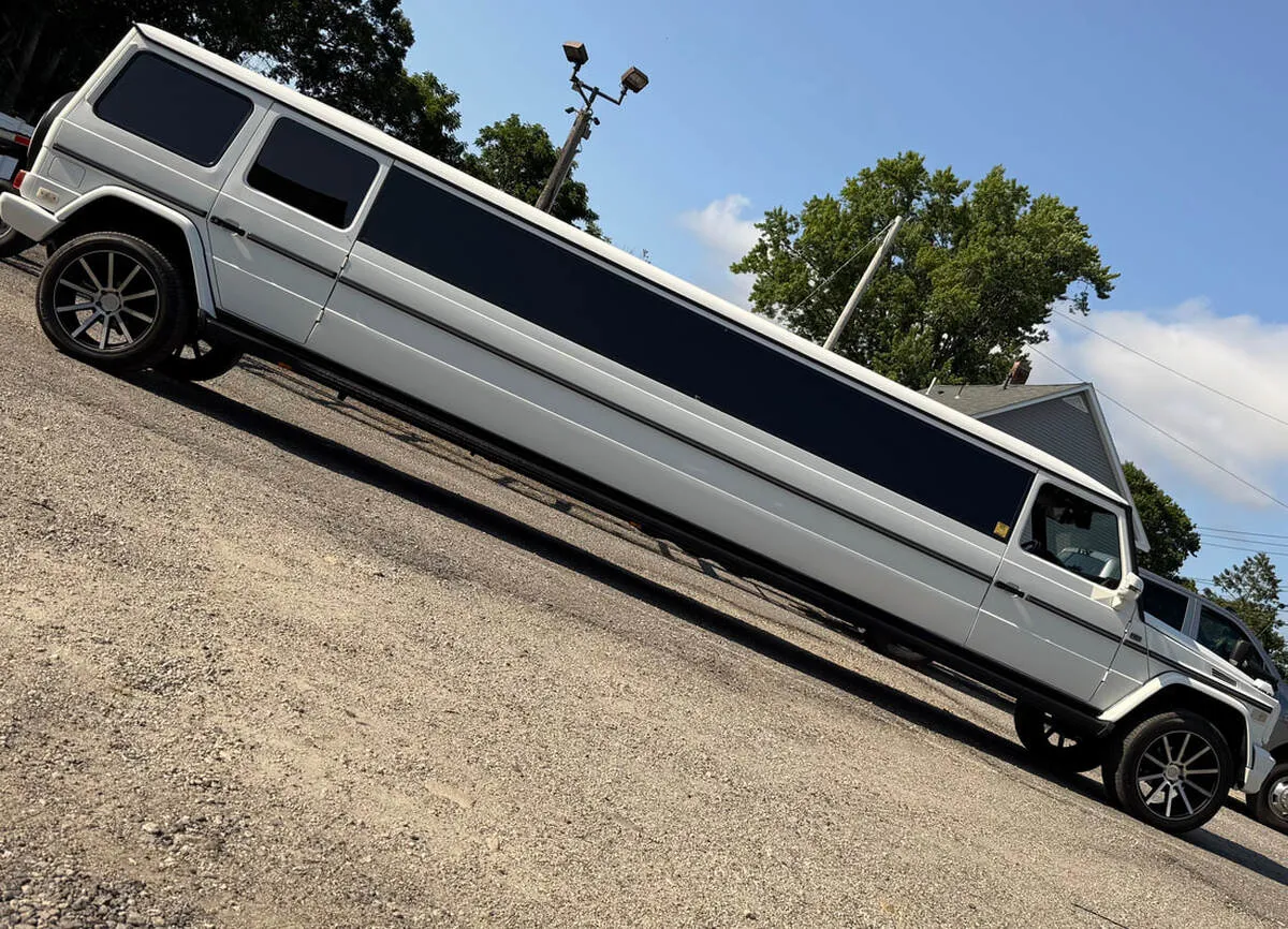 White Mercedes G Wagon exterior with tinted windows, photo 5 for limo rental