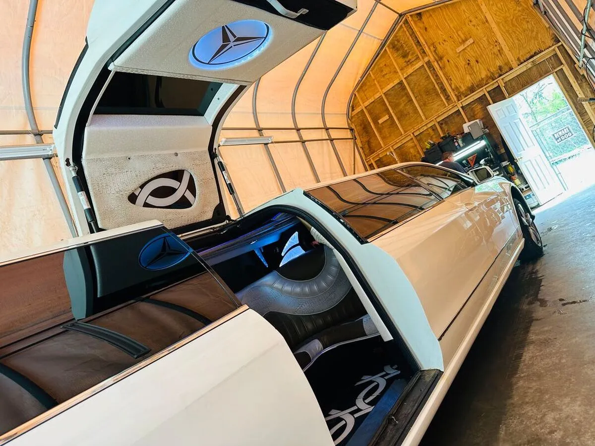White Mercedes JET Doors Limousine with bridal (jet) door for limo rental