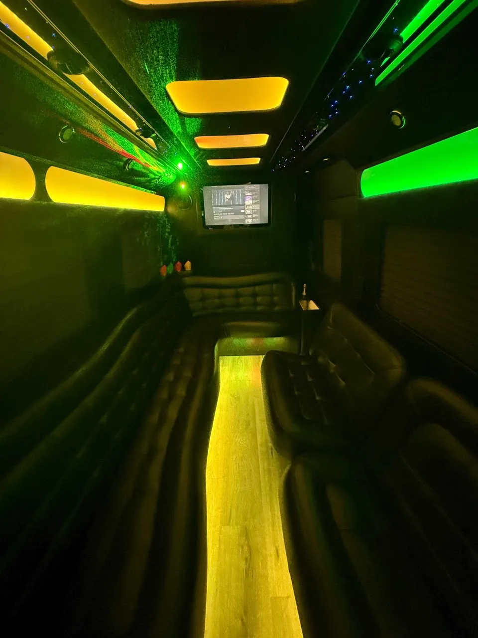 Mercedes Limo Sprinter interior with perimeter lounge seating, LED accent lighting and LED ceiling lighting, photo 3 for party bus rental