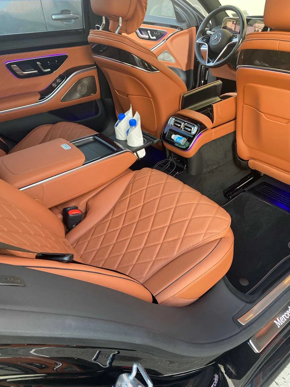 Mercedes S Class interior with rear passenger controls and LED accent lighting for wedding car rental