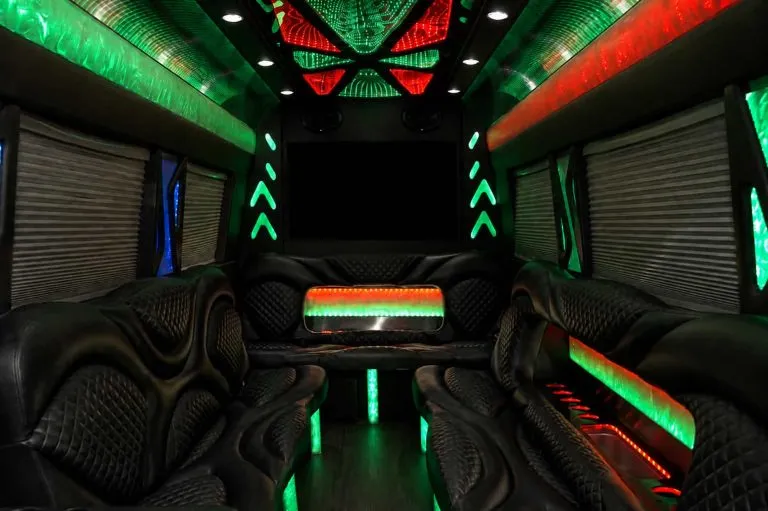 Mercedes Sprinter Limousine interior with perimeter lounge seating, window shades and LED accent lighting, photo 2 for party bus rental