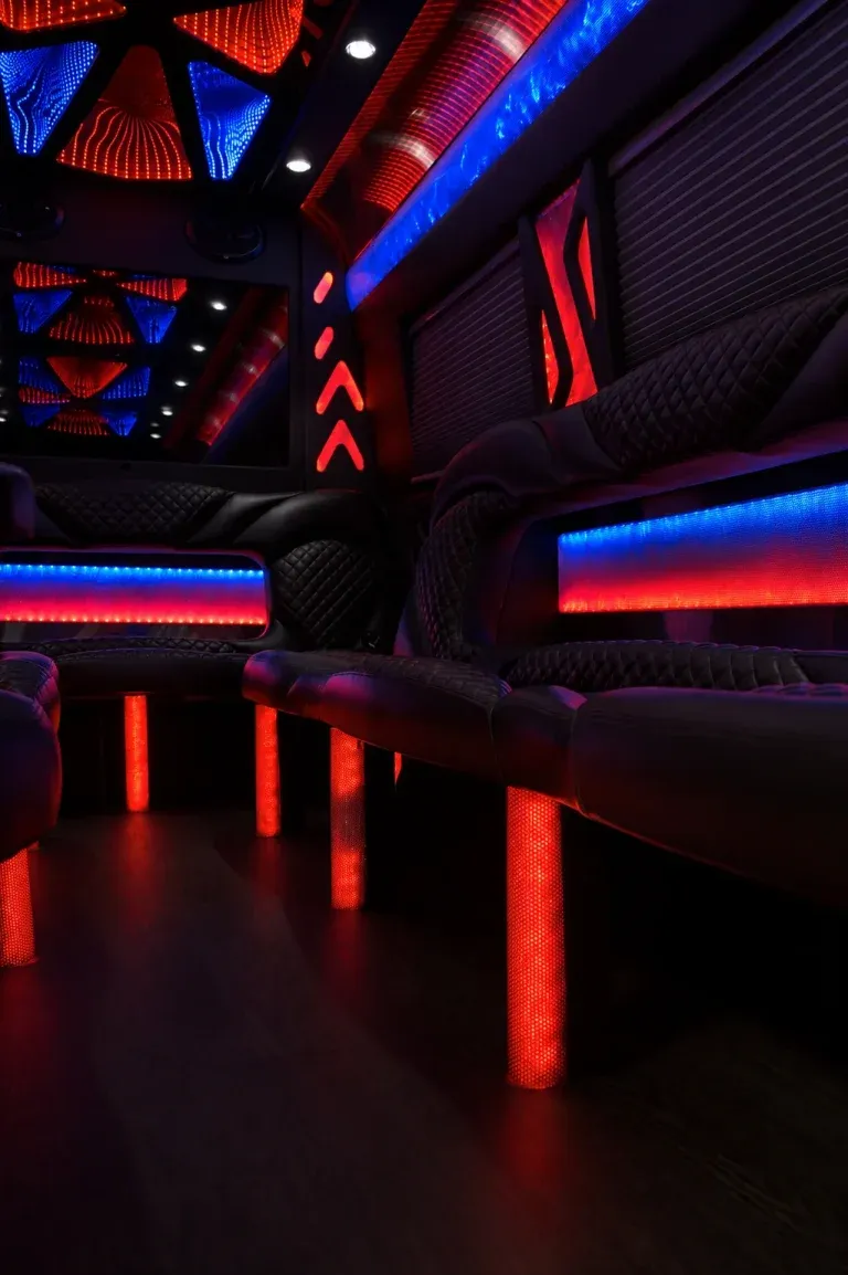 Mercedes Sprinter Limousine interior with window shades, LED accent lighting and LED ceiling lighting for party bus rental