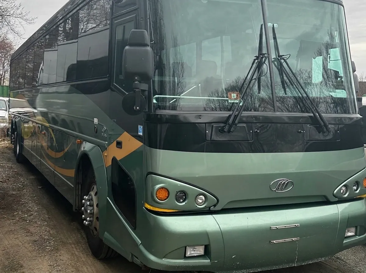 55 Passenger Motor Coach 55 Passenger Motor Coach, green – for rent